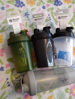 Lot of 4 New Blender Bottles 3- Small one- Large New With tags Shaker cups ..